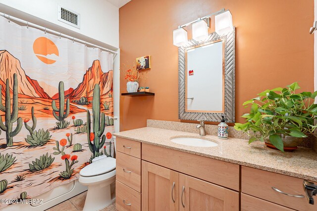 bathroom featuring vanity, toilet, curtained shower, and tile patterned floors