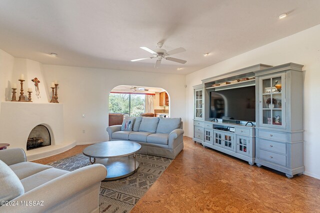 living room featuring ceiling fan