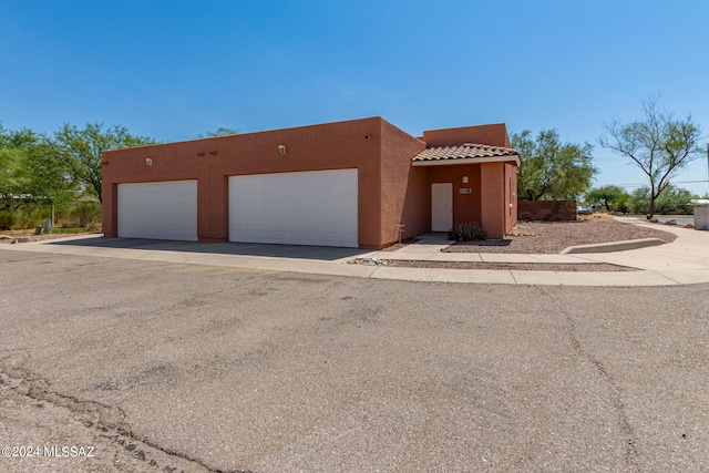 exterior space featuring a garage