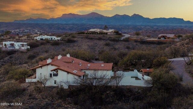 aerial view at dusk with a mountain view