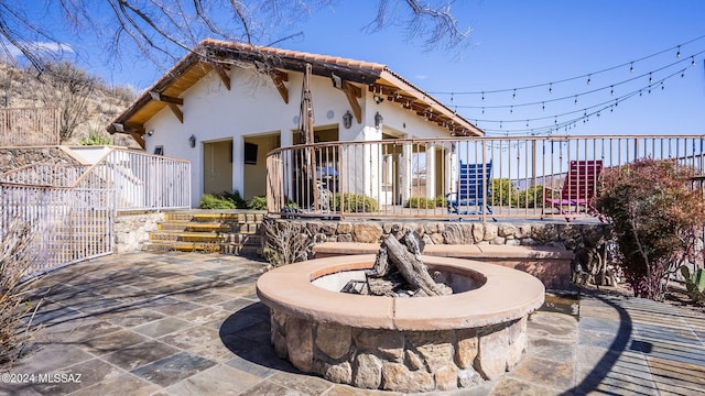 view of patio / terrace featuring fence