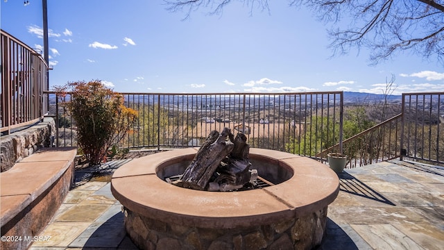 view of patio / terrace featuring a mountain view