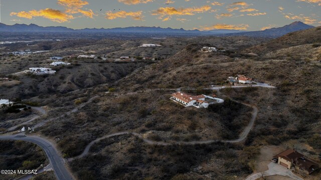 aerial view at dusk with a mountain view