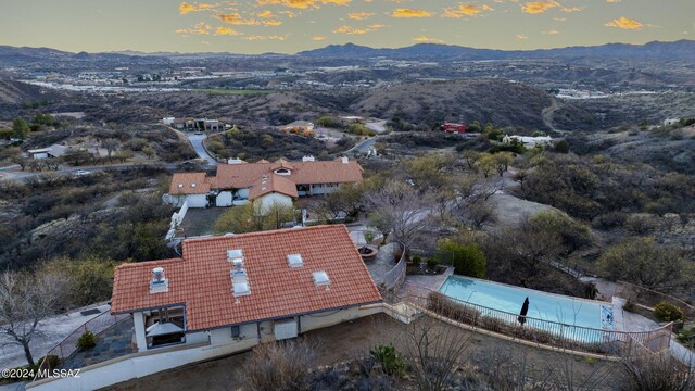 aerial view at dusk with a mountain view