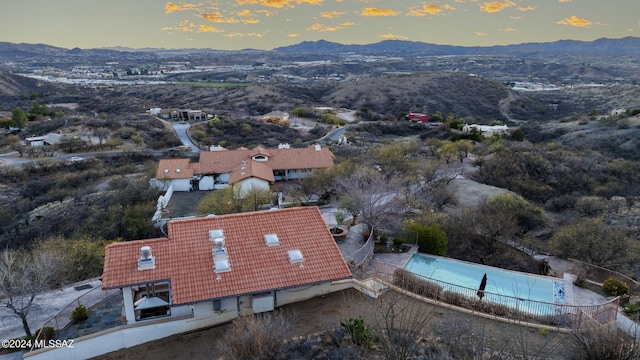 aerial view at dusk with a mountain view