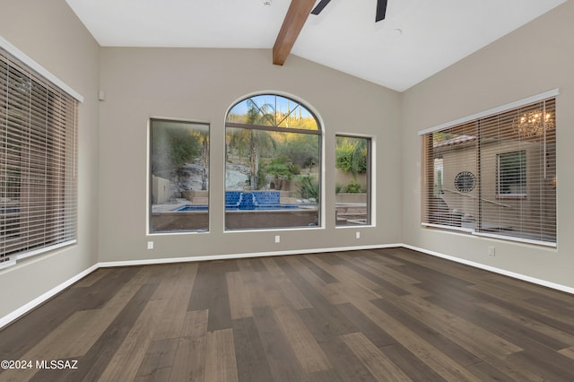 empty room featuring lofted ceiling with beams, ceiling fan with notable chandelier, and dark hardwood / wood-style floors