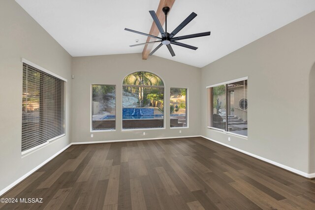 interior space with ceiling fan, lofted ceiling with beams, and dark wood-type flooring