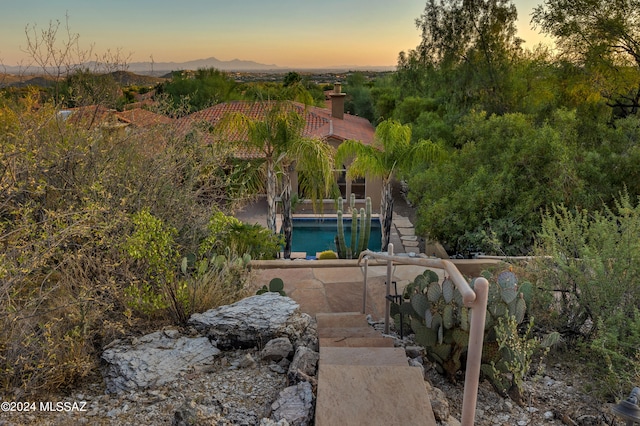 view of aerial view at dusk