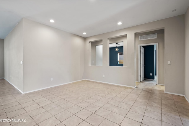 view of tiled spare room