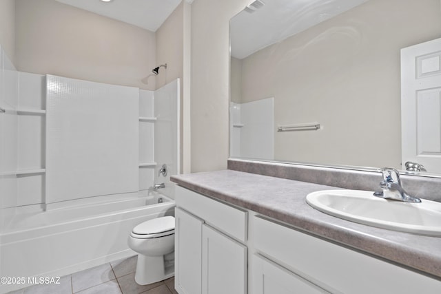 full bathroom with toilet, vanity, tile patterned floors, and shower / bath combination