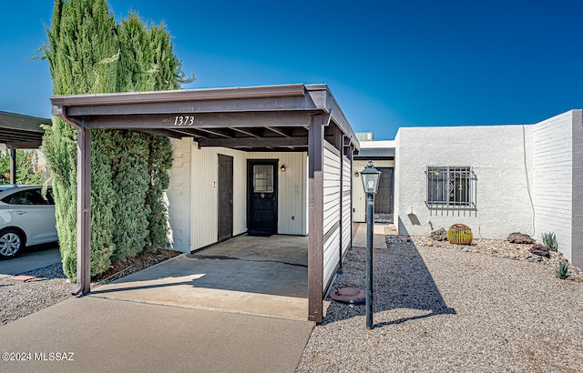 view of front of house featuring a carport