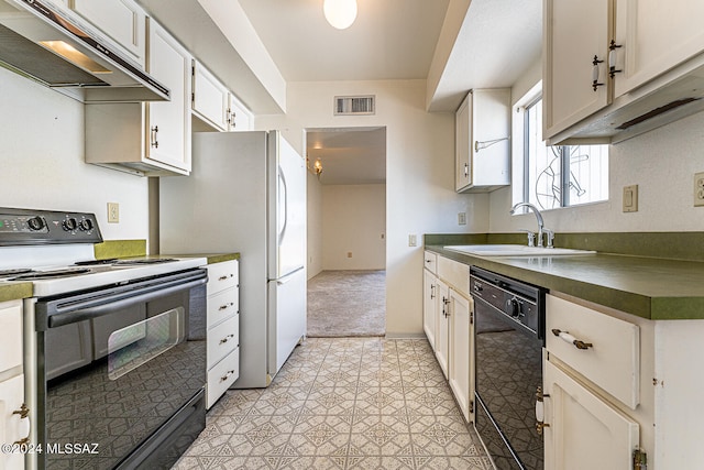 kitchen with black appliances, sink, and white cabinets