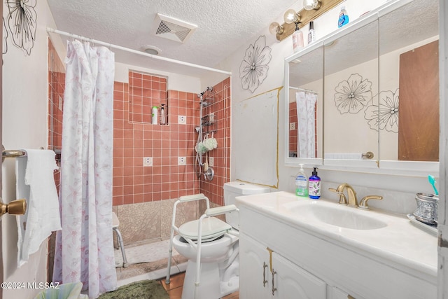 bathroom featuring vanity, a shower with curtain, tile patterned floors, and toilet