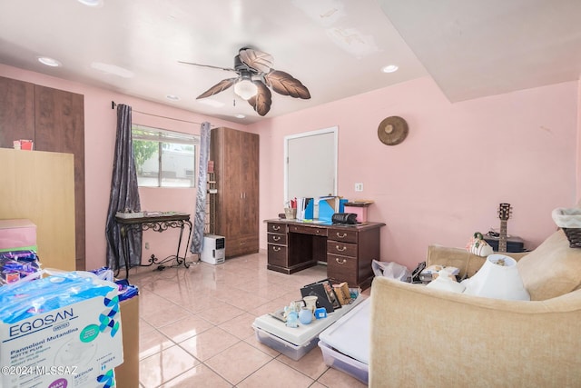 bedroom featuring light tile patterned floors and ceiling fan