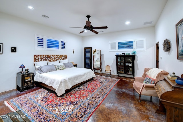 bedroom featuring finished concrete flooring, a ceiling fan, visible vents, and recessed lighting