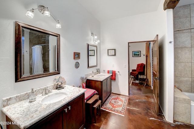 full bathroom featuring a tub, two vanities, a sink, and a shower with shower curtain