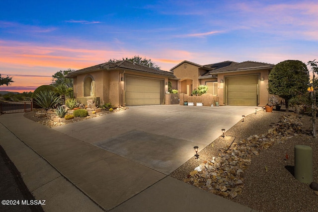 view of front of property with a garage