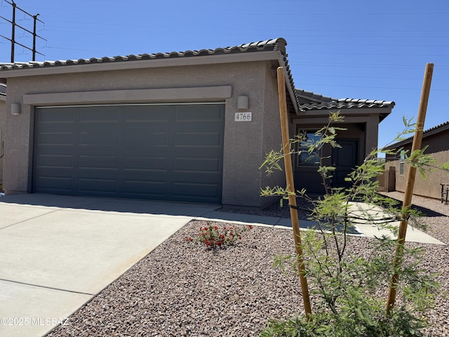 exterior space with concrete driveway