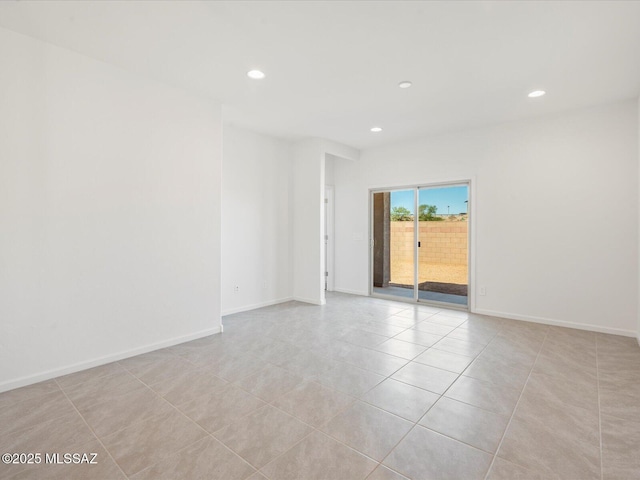 unfurnished room featuring recessed lighting, baseboards, and light tile patterned flooring