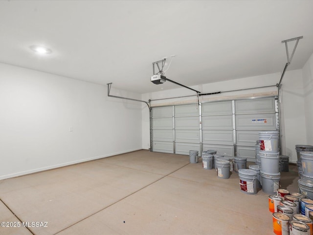 garage featuring a garage door opener