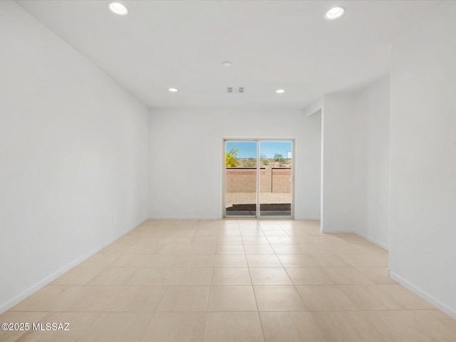 spare room with recessed lighting, baseboards, light tile patterned flooring, and visible vents
