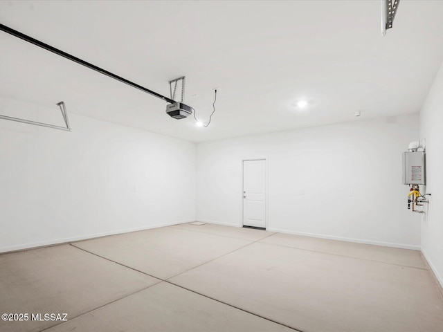 garage with baseboards and a garage door opener