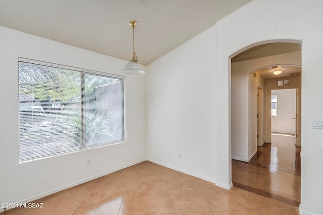 empty room featuring tile patterned floors