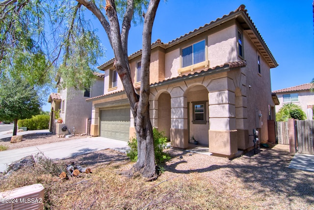 view of front of property featuring a garage