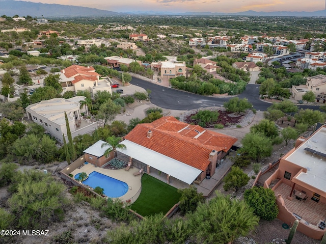 bird's eye view featuring a residential view and a mountain view