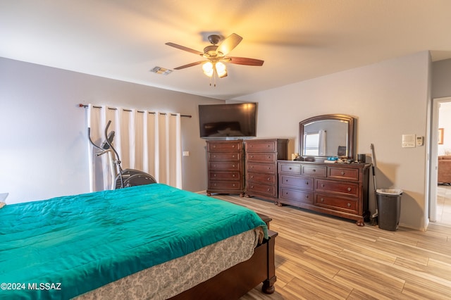 bedroom featuring ceiling fan and light hardwood / wood-style floors