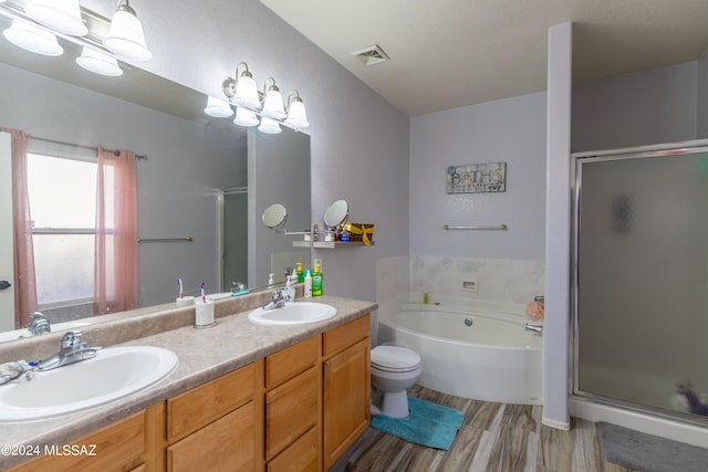 full bathroom with vanity, hardwood / wood-style flooring, and independent shower and bath