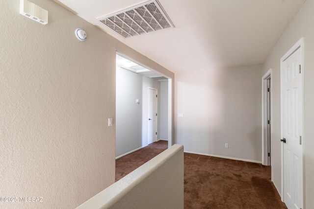 carpeted office with ceiling fan