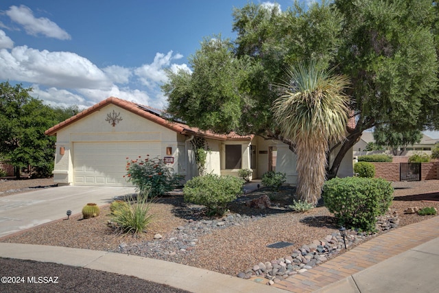 view of front of property featuring a garage