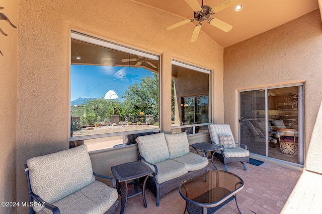 view of patio / terrace featuring ceiling fan