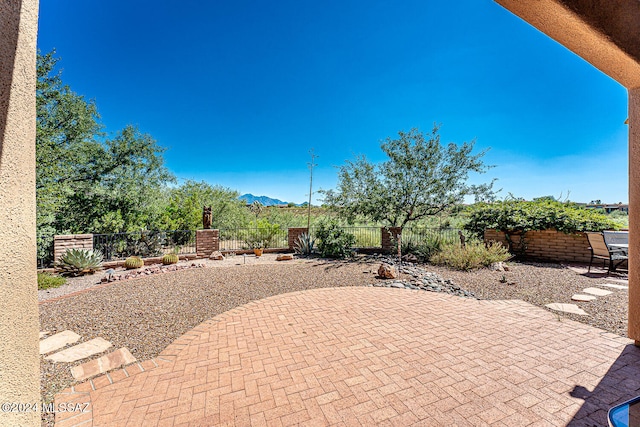 view of patio featuring a mountain view