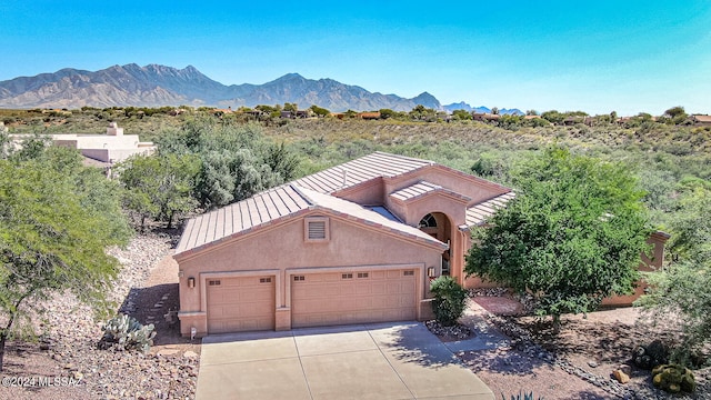 drone / aerial view featuring a mountain view