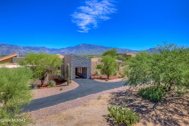 view of front of home featuring a mountain view