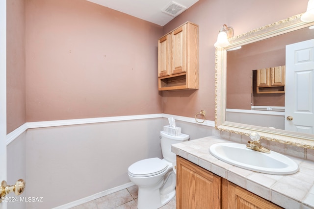 kitchen featuring light tile patterned flooring, dishwasher, pendant lighting, tile countertops, and sink