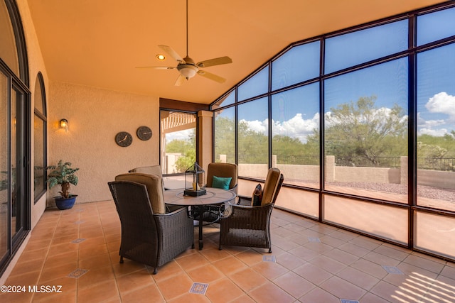 carpeted bedroom featuring ceiling fan and access to exterior