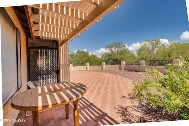 view of patio / terrace with a pergola