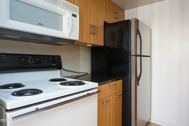 kitchen featuring white appliances