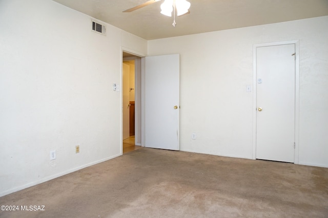 interior space with ceiling fan