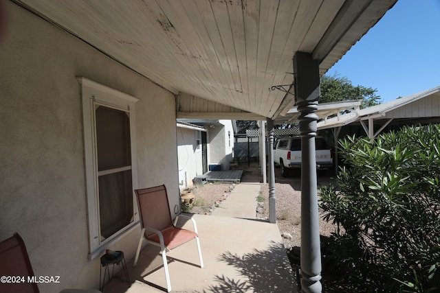 view of patio with a carport