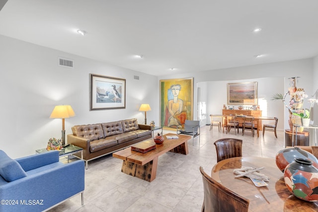 living room with light tile patterned floors