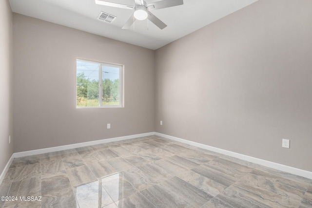 empty room featuring ceiling fan