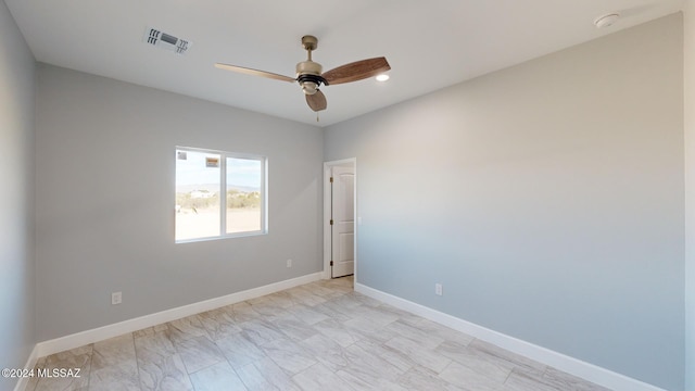 unfurnished room featuring ceiling fan