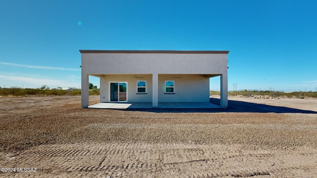 rear view of property with a patio