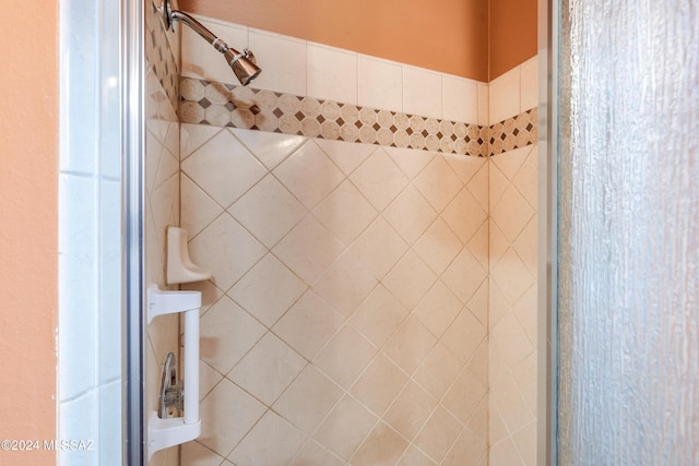 details featuring a tile shower