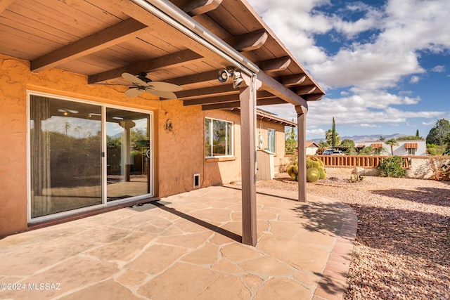 view of patio / terrace featuring ceiling fan