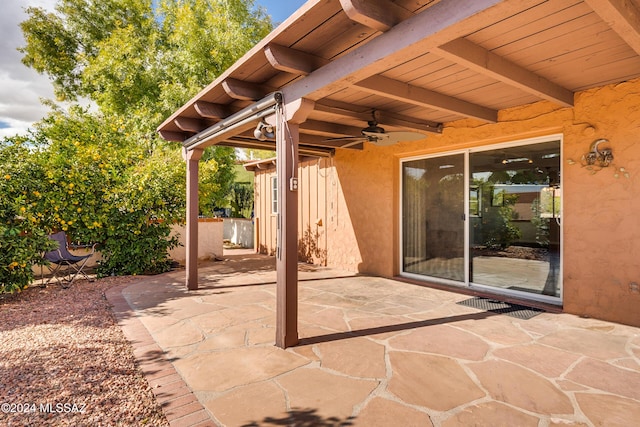 view of patio / terrace featuring ceiling fan